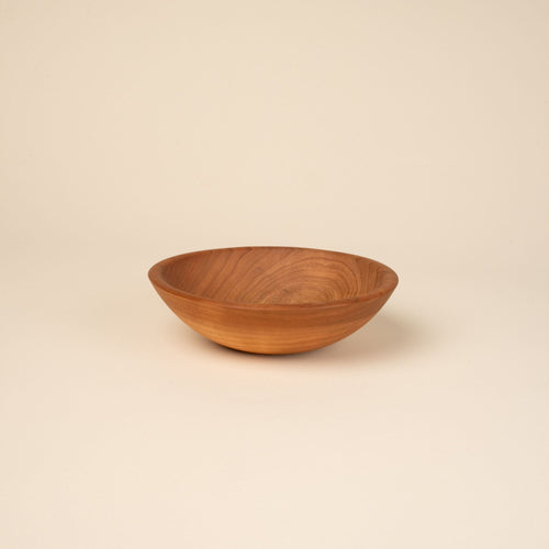 A small cherry wood bowl