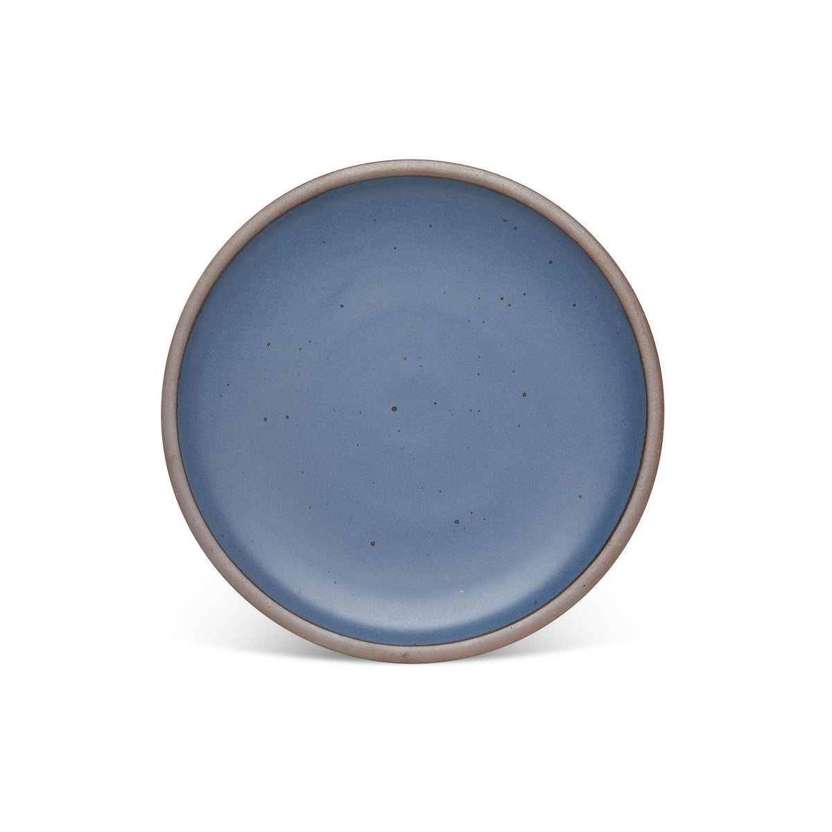 A dinner sized ceramic plate in a cool, medium blue color featuring iron speckles and an unglazed rim.