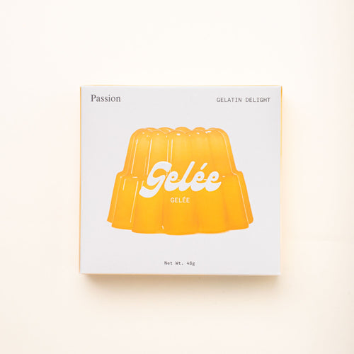 A box of Gelée Passion Gelatin Delight, featuring a golden-yellow gelatin mold illustration on a clean white package.