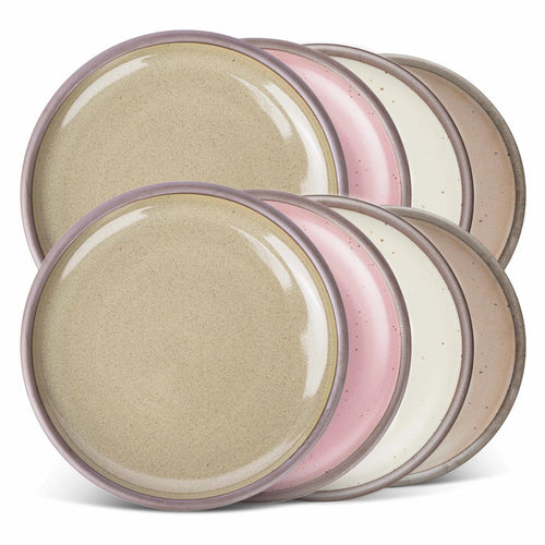 8 dinner sized ceramic plates in a reflective dappled grey-green, warm off-white, warm pale brown and dusty mauve pink colors featuring iron speckles and an unglazed rim