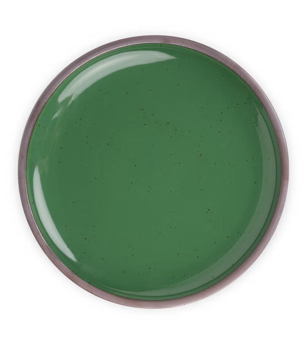 A large ceramic platter in a glossy emerald green color featuring iron speckles and an unglazed rim.