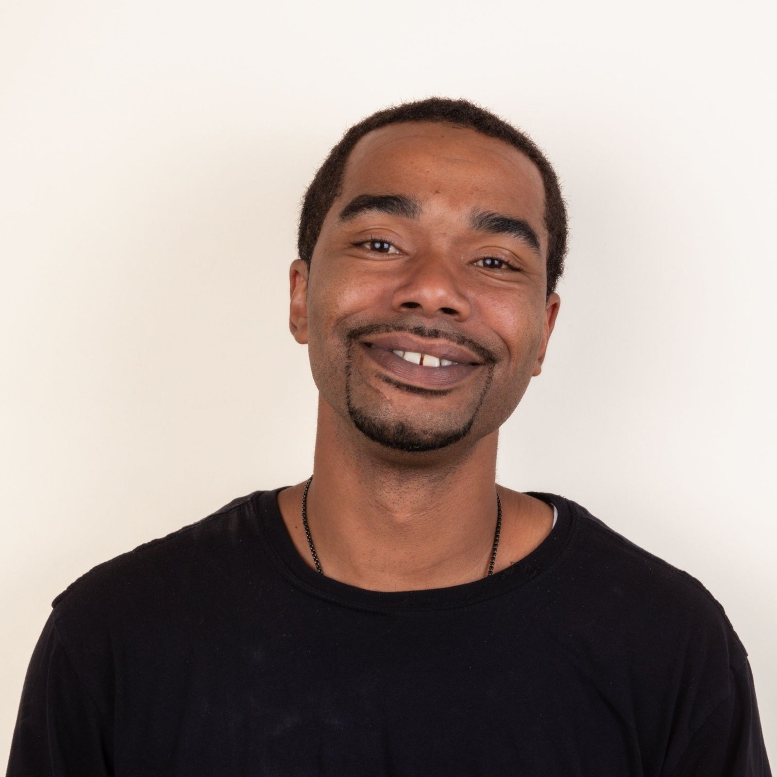 A headshot of Tyrelle J.