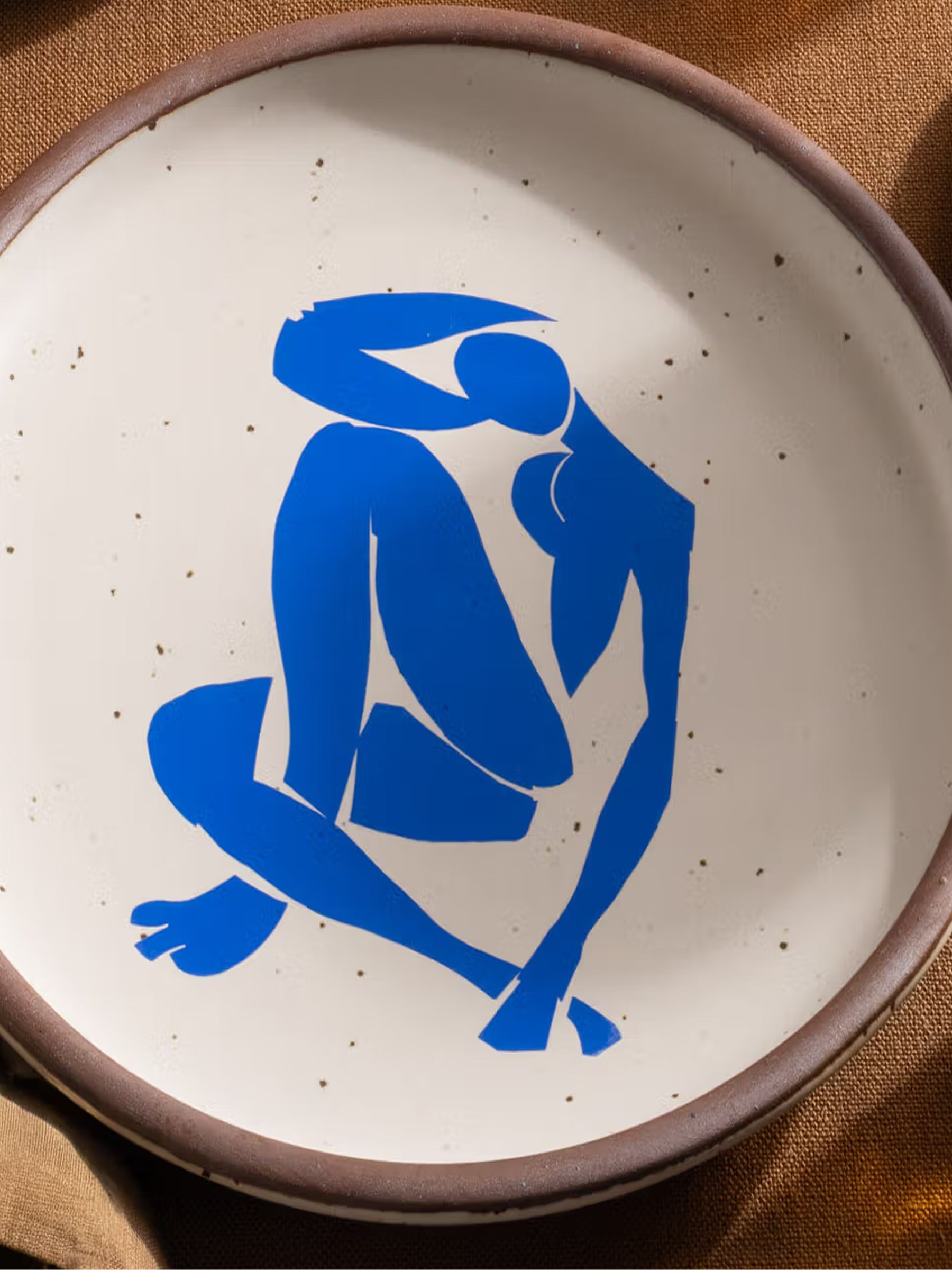 A ceramic plate with Nu Bleu by Henri Matisse.