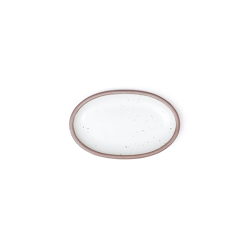 A small oval ceramic platter in a cool white color featuring iron speckles and an unglazed rim