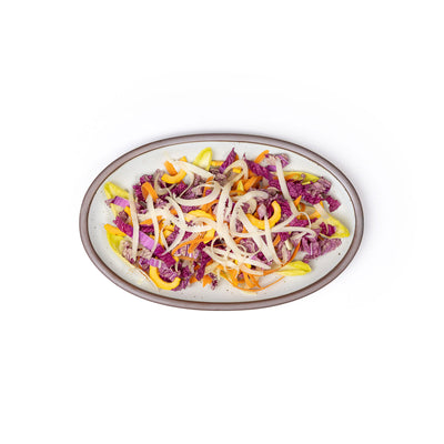 A medium oval platter with a colorful salad
