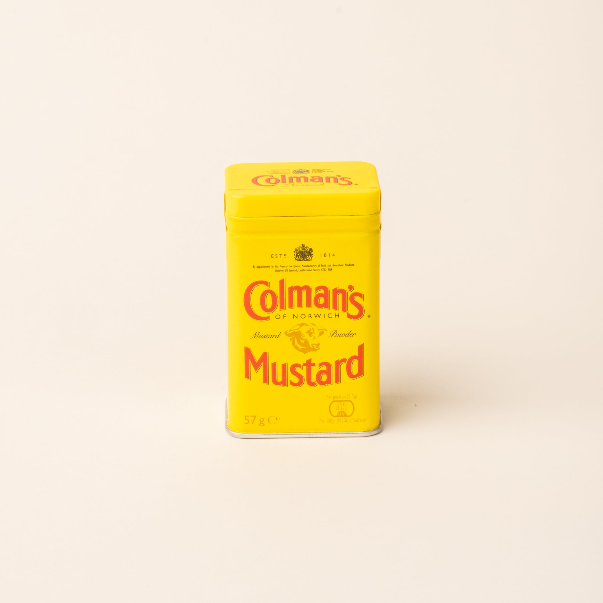 Colman's Mustard Powder tin on a plain white background.