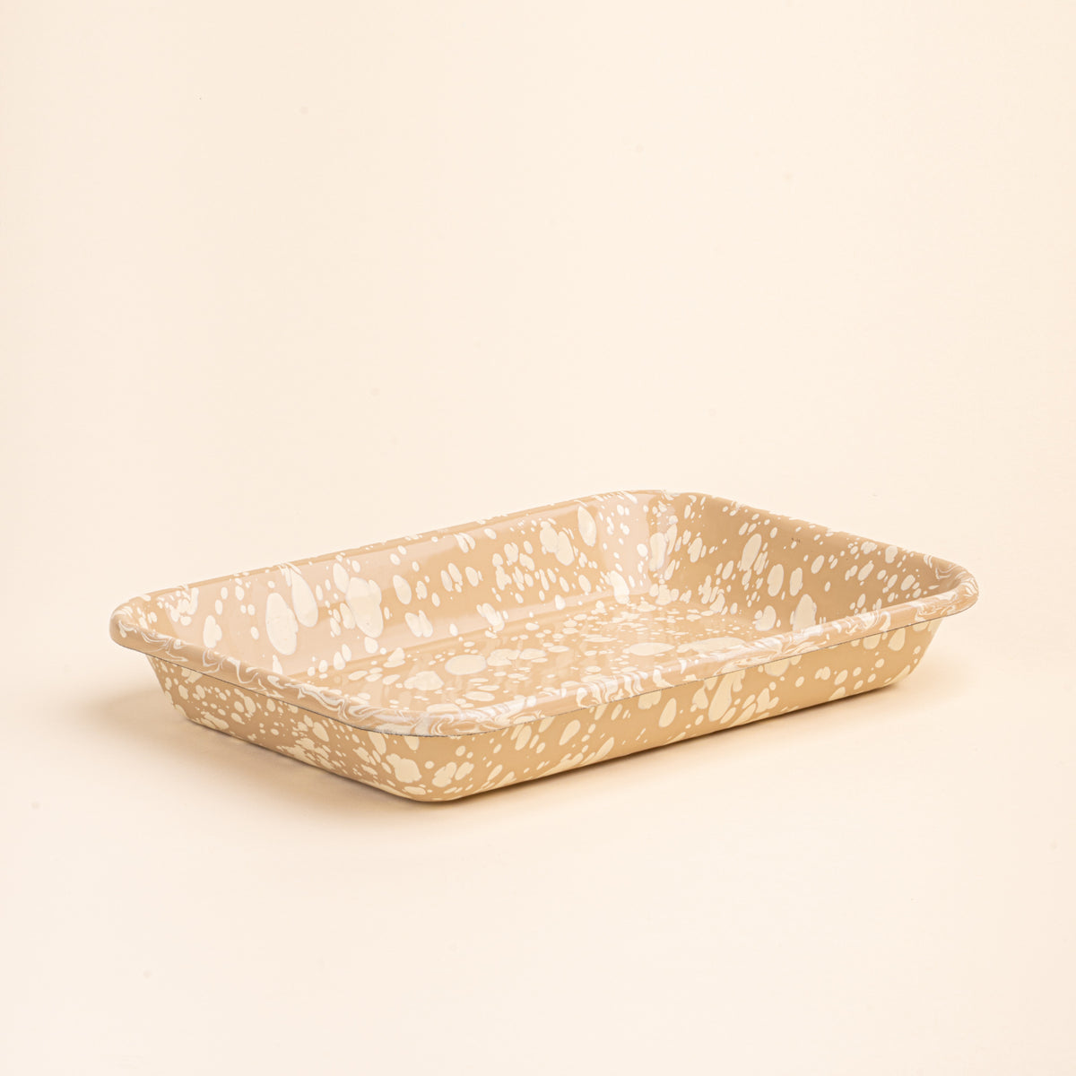 Large rectangular baking dish in a neutral tan color with off-white splattered pattern.