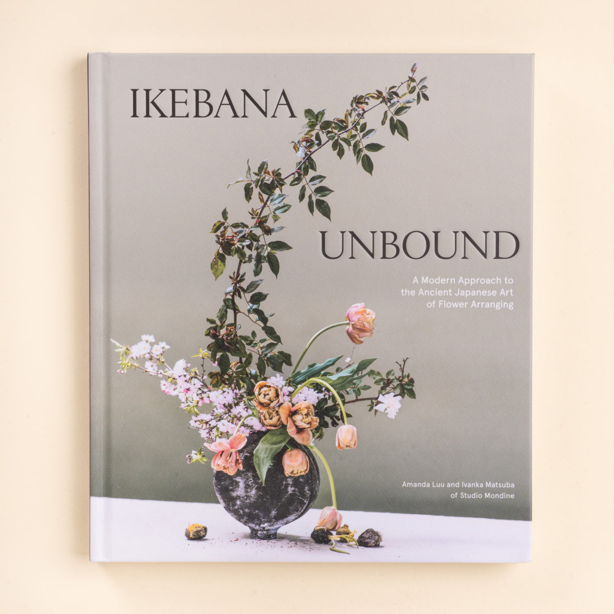Book titled “Ikebana Unbound” with a floral arrangement on the cover, shown against a light background.