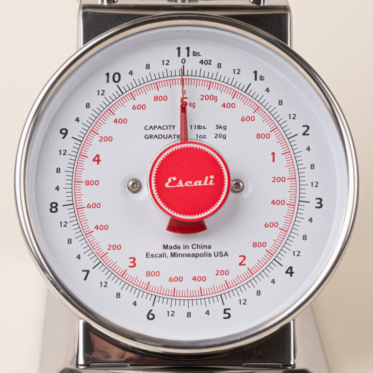 Closeup of a stainless steel vintage kitchen scale