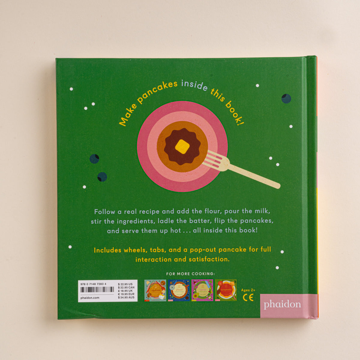 Green back cover of the Pancakes! interactive recipe book with an illustration of a pancake on a plate.