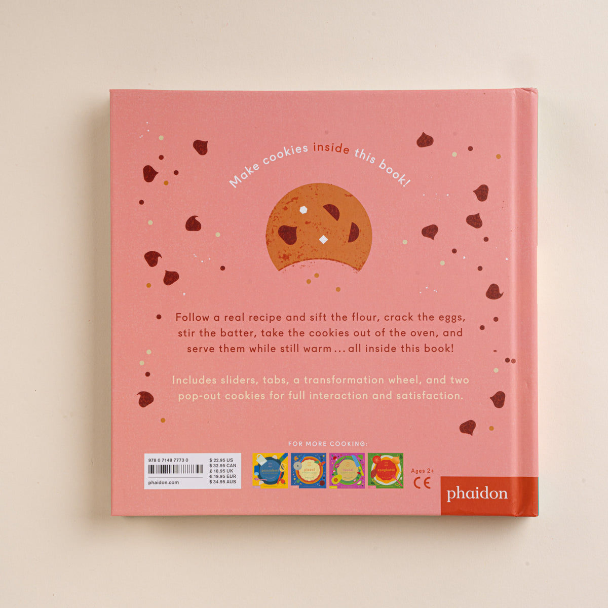 Pink back cover of the Cookies! interactive recipe book with an illustrated chocolate chip cookie and scattered chocolate chips.