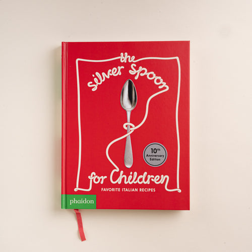 Red cover of The Silver Spoon for Children cookbook featuring a silver spoon illustration.