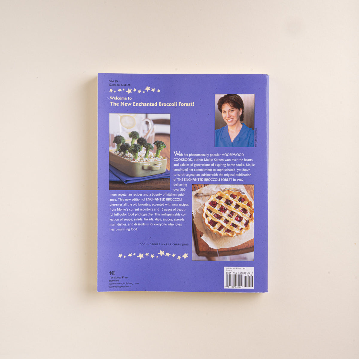 Back cover of The New Enchanted Broccoli Forest cookbook with photos of broccoli, a lattice-topped pie, and the author.
