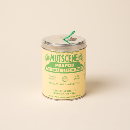 Metal tin of Nutscene Peapod garden twine with green jute string.