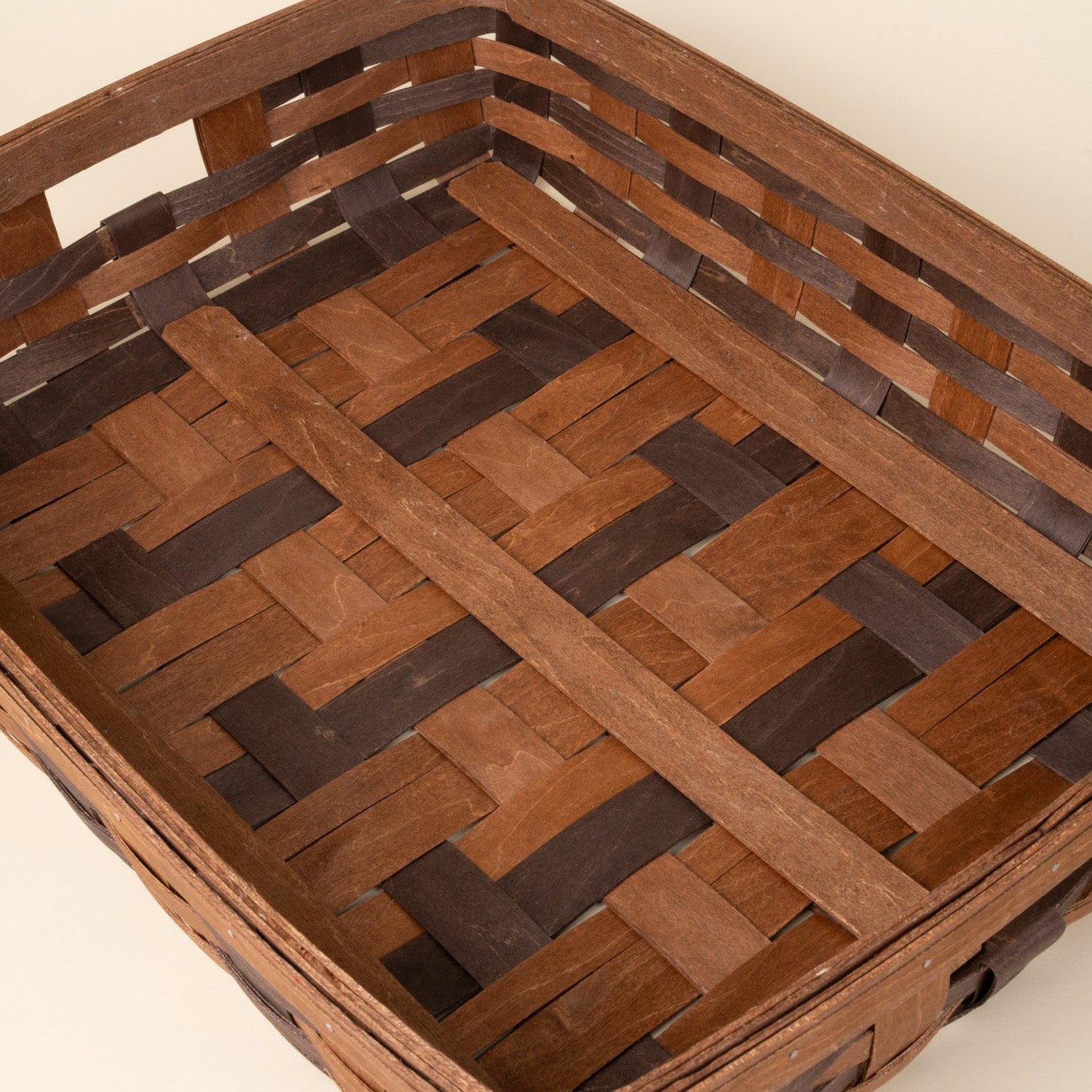 Detail of inside the tray of the maple splint basket.