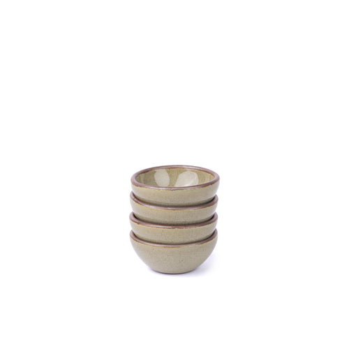 A stack of 4 tiny rounded ceramic bowls in a reflective dappled grey-green color featuring unglazed rim