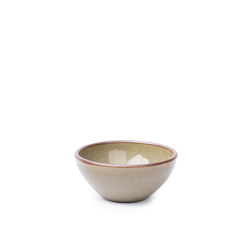 A small dessert sized rounded ceramic bowl in a reflective dappled grey-green color featuring an unglazed rim