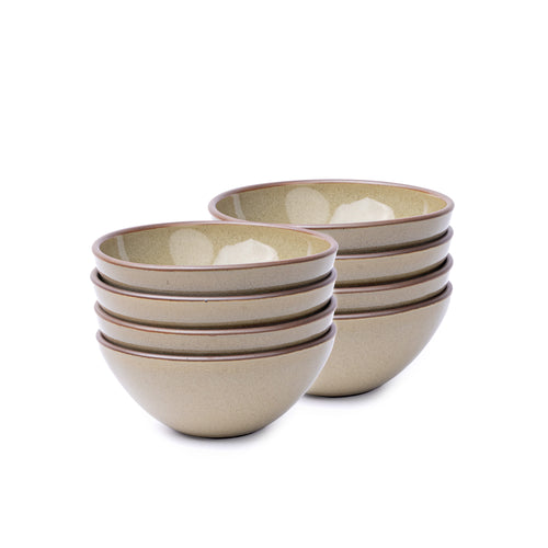 A stack of 8 medium rounded ceramic bowls in a reflective dappled grey-green color featuring an unglazed rim