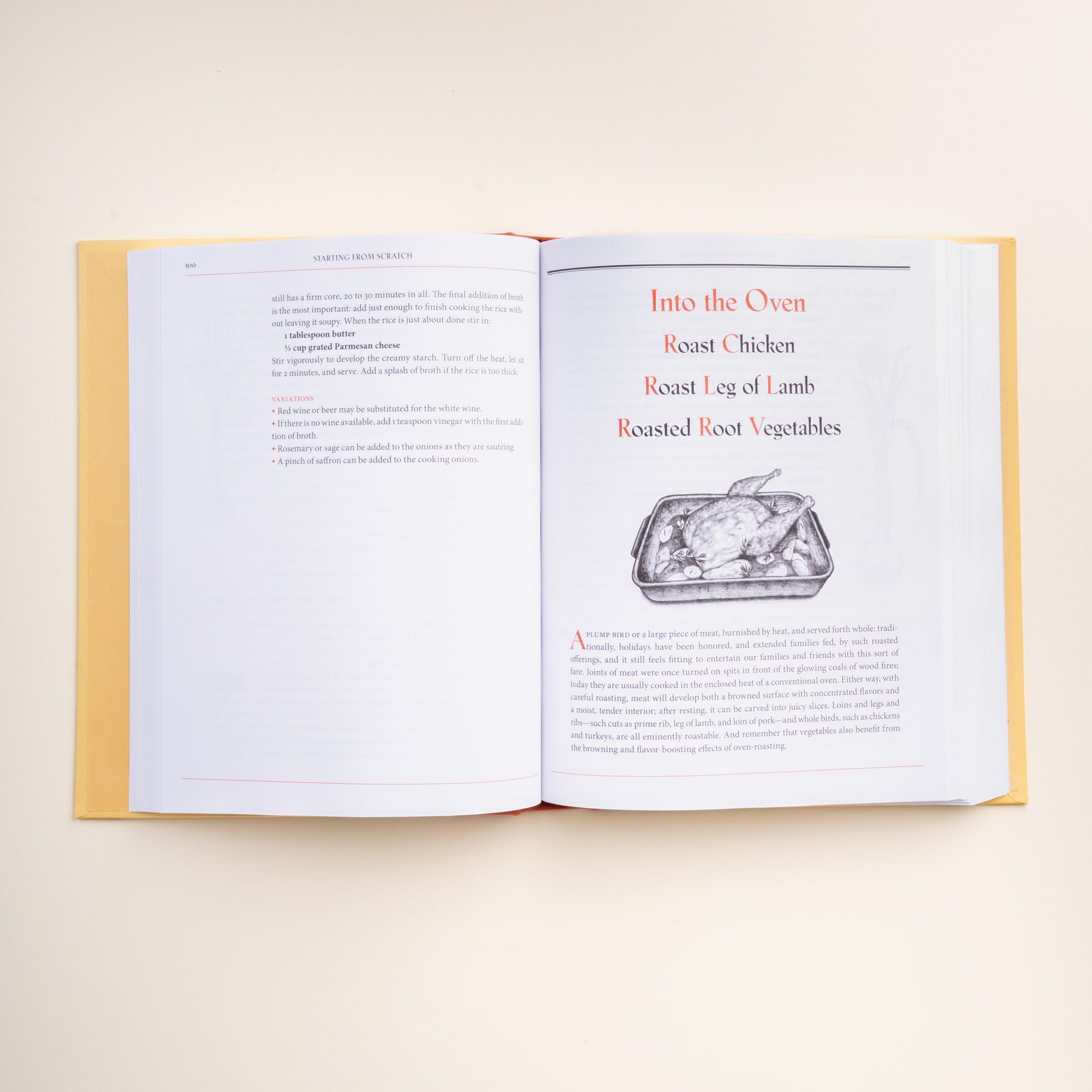 Open cookbook showing a roast chicken illustration with recipes for roast chicken, leg of lamb, and roasted root vegetables.