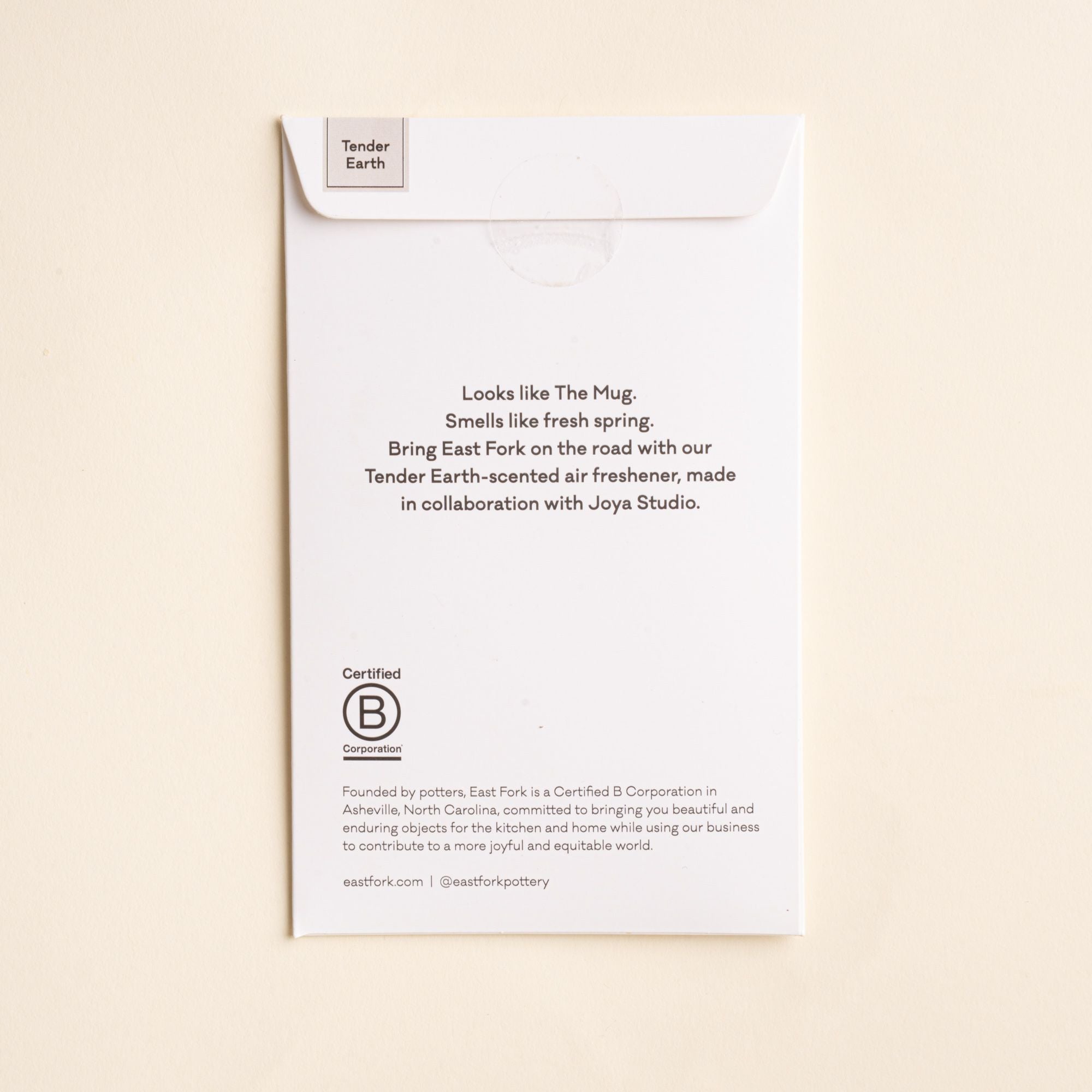 Back of East Fork “Tender Earth” air freshener packaging — describes the scent as “fresh spring” and highlights the Joya Studio collaboration and Certified B Corp status.