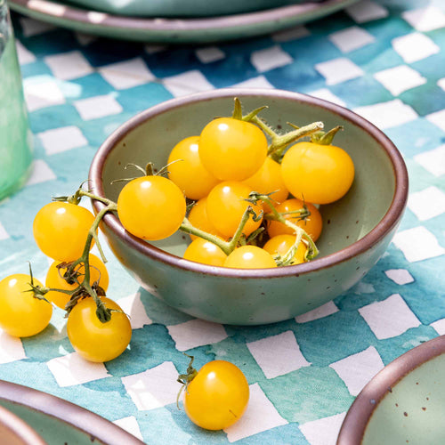 A small, deep ceramic bowl perfect for two scoops of ice cream in a viridian green glaze with a matte finish.