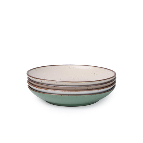 Four shallow ceramic bowl-plates with a wide rim for composed dishes in a viridian green, warm brown, warm white and cool white glazes.