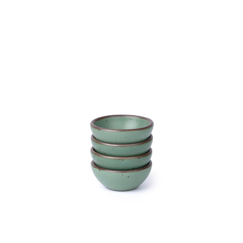 Four small ceramic bowls for salt, mise en place, or jewelry in a viridian green glaze with a matte finish.
