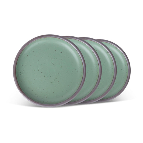 Four ceramic plates fit for lunch of small meals in a viridian green glaze with a matte finish.