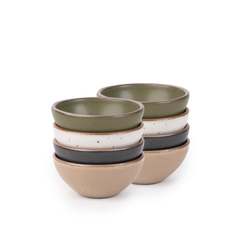 8 small dessert sized rounded ceramic bowls in an olive green, graphite black, off-white, and warm pale brown colors featuring iron speckles and an unglazed rim