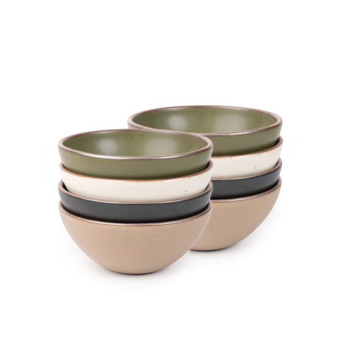 8 medium sized rounded ceramic bowls in an olive green, graphite black, off-white, and warm pale brown colors featuring iron speckles and an unglazed rim