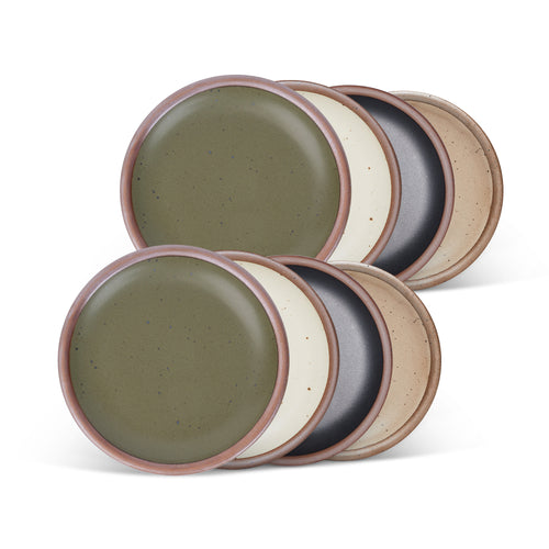 8 dessert sized ceramic plates in an olive green, warm off-white, graphite black and pale warm brown color featuring iron speckles and an unglazed rim.