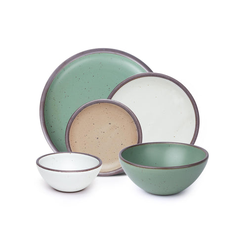 A 5-piece tablesetting with plates and deep bowls in a viridian green, warm brown, warm white and cool white glazes.