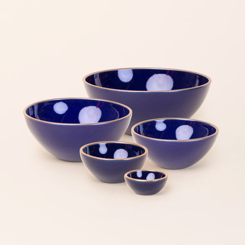 A bitty bowl, ice cream bowl, soup bowl, popcorn bowl, and mixing bowl paired together in a glossy dark blue color featuring iron speckles