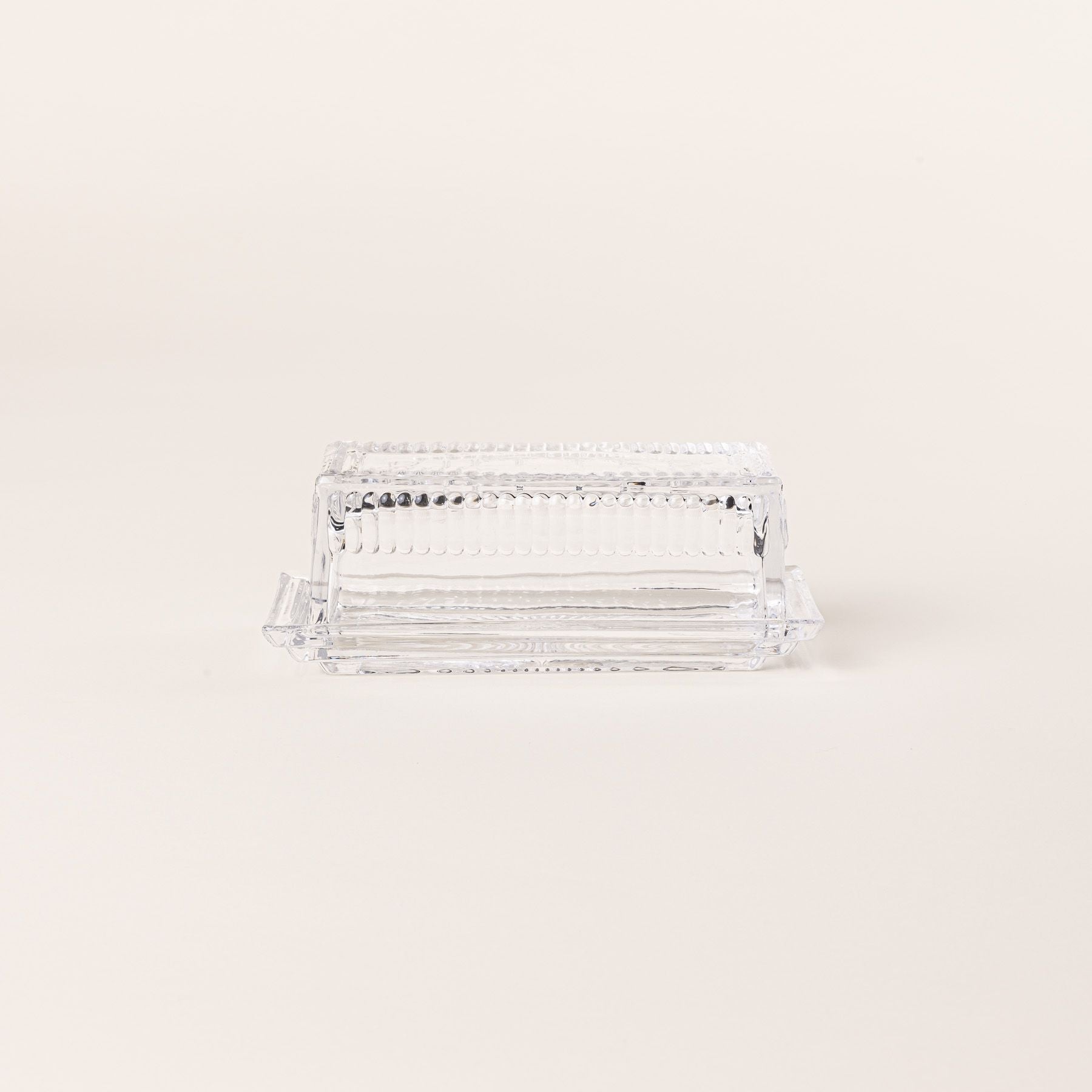 Traditional glass butter dish with 'Butter' on top