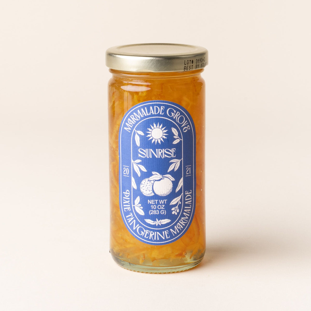 A jar of Marmalade Grove Sunrise Pixie Tangerine Marmalade, with a blue label featuring a sun and citrus illustration.