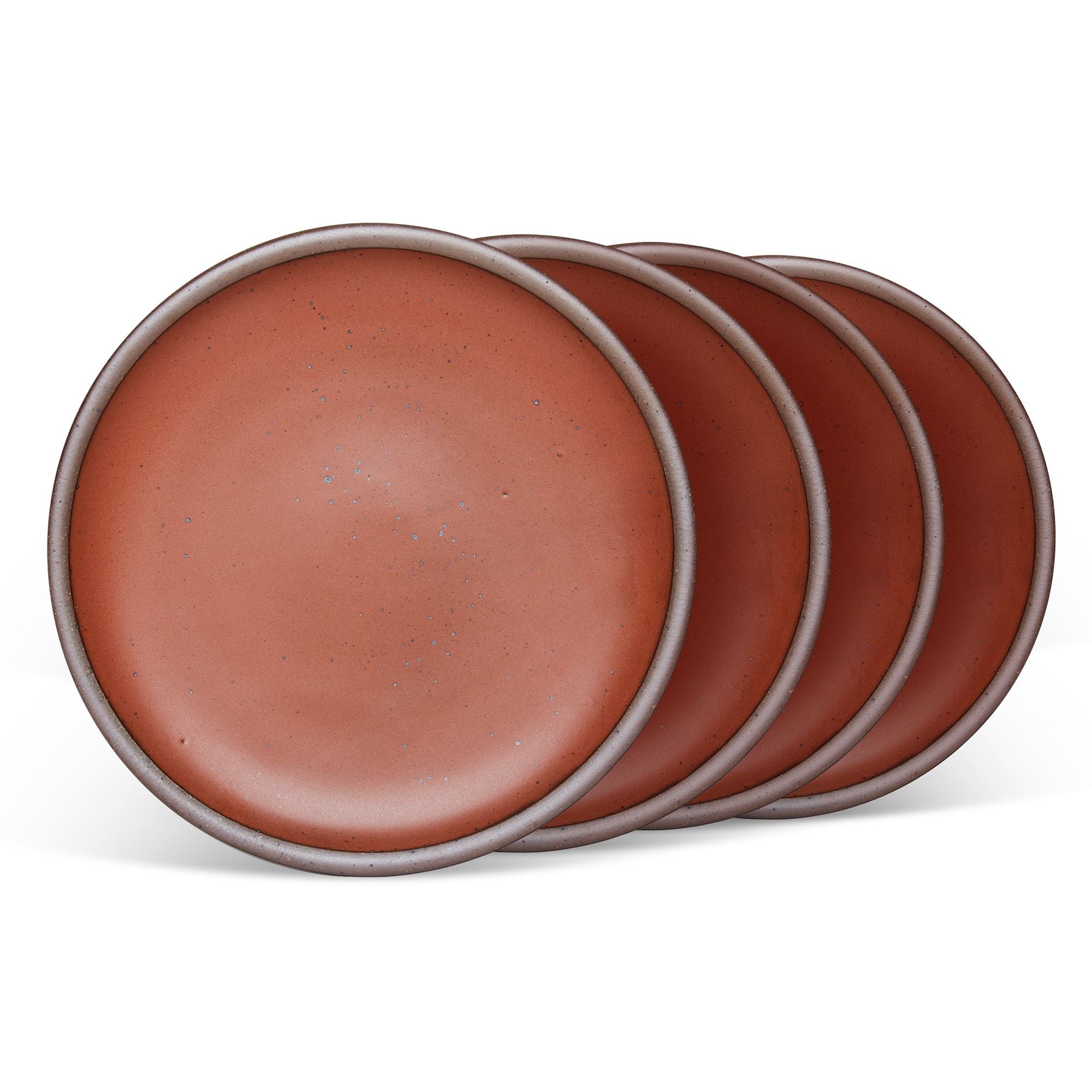 4 dinner sized ceramic plates in a cool burnt terracotta color featuring iron speckles and an unglazed rim