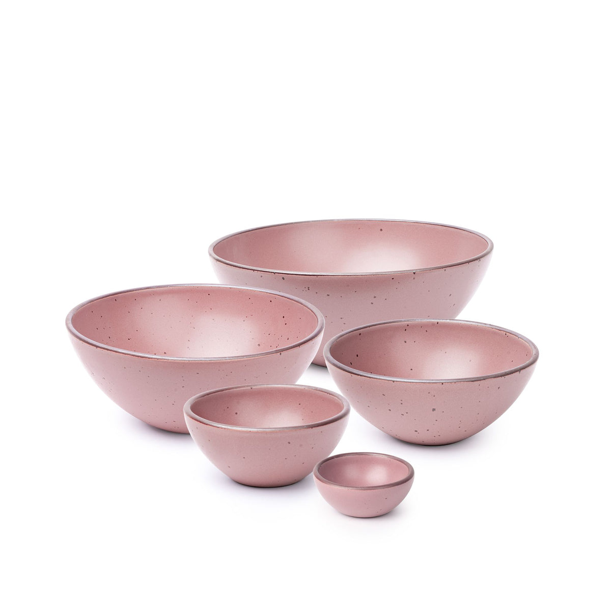 A bitty bowl, ice cream bowl, soup bowl, popcorn bowl, and mixing bowl in a dusty mauve pink color featuring iron speckles