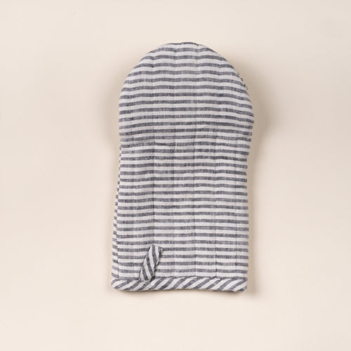 Back of gray-and-white striped linen oven mitt with stitched channels and a small hanging loop, laid flat on a light background.