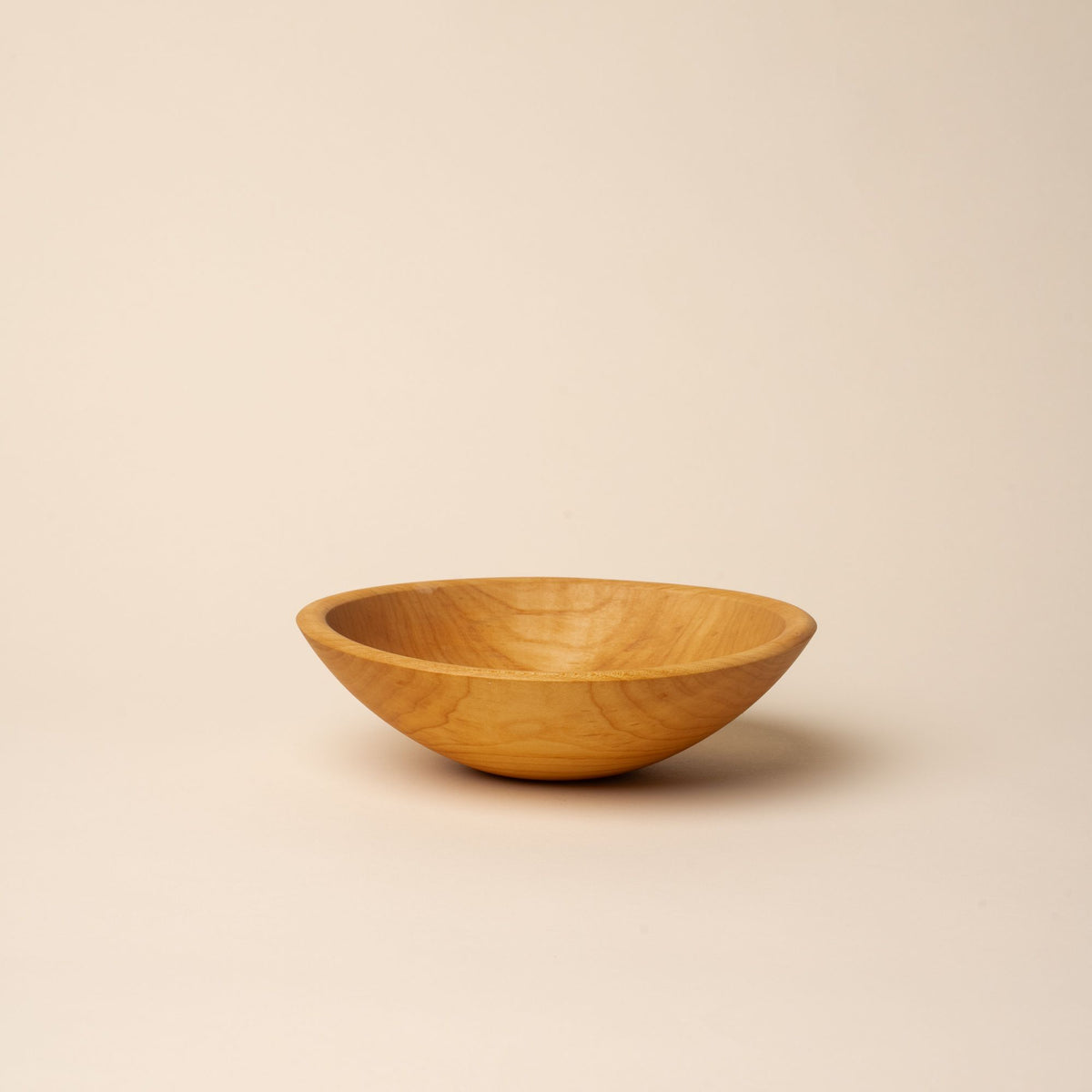 A small maple wood bowl