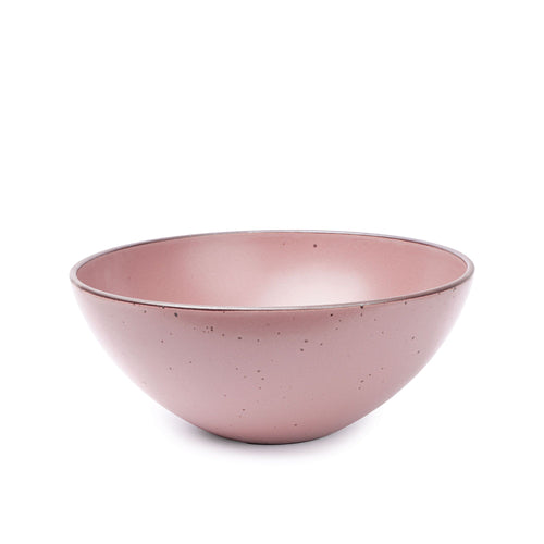A large ceramic mixing bowl in a dusty mauve pink color featuring iron speckles and an unglazed rim