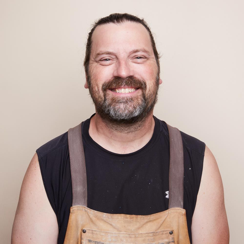 A headshot of Karl K.