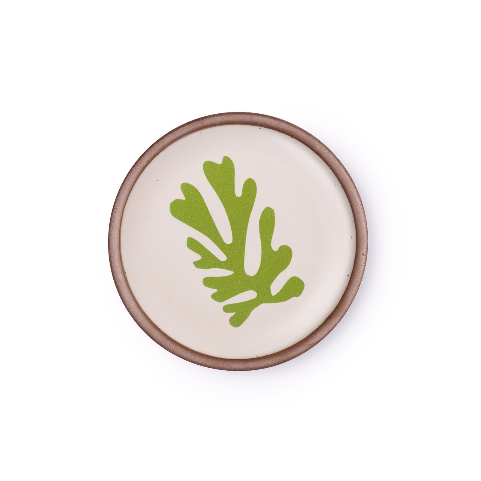 A ceramic dessert sized plates in a warm off-white color with unglazed rim, a frond-like cut-outs from Henri Matisse’s La Perruche et la sirène.