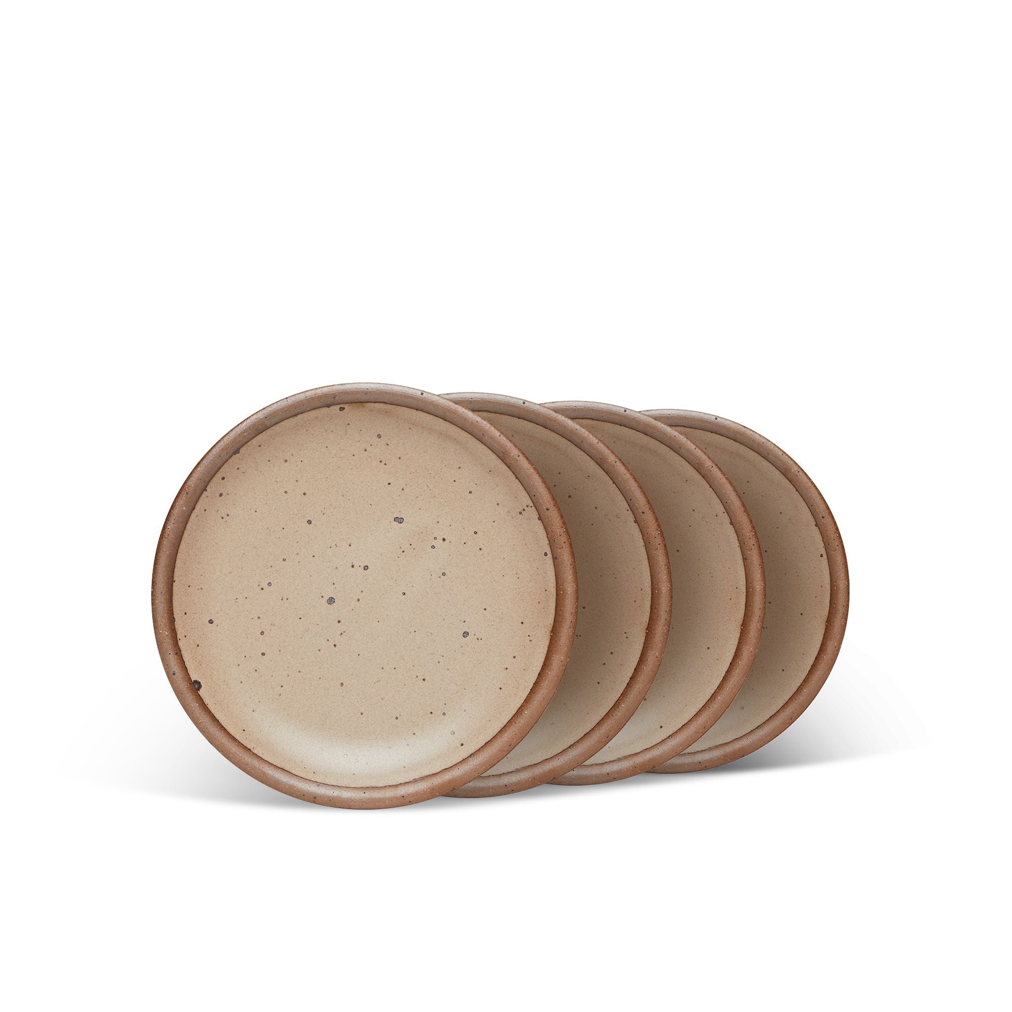 4 dessert sized ceramic plates in a warm pale brown color featuring iron speckles and an unglazed rim.