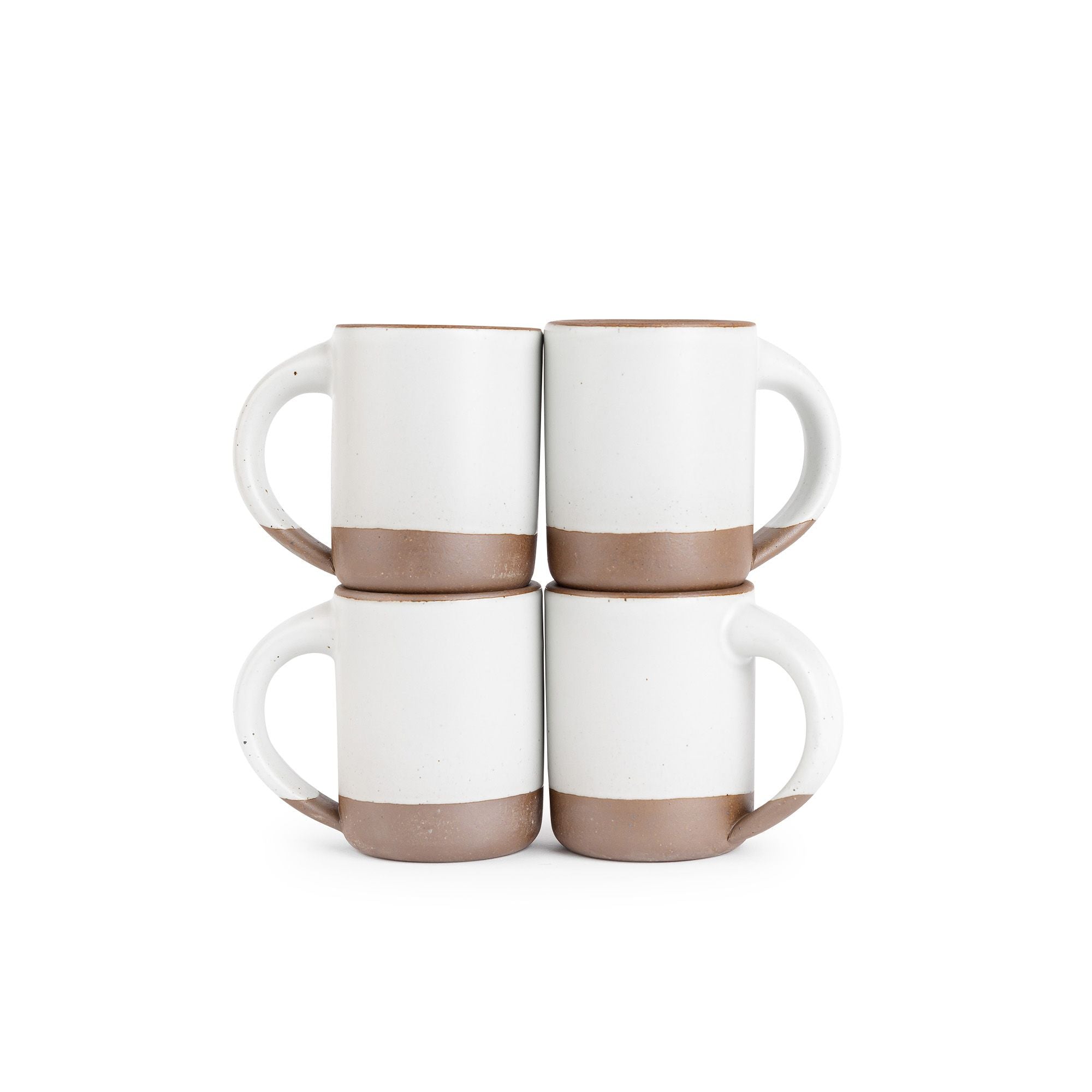 Four medium sized ceramic mugs with handles in a cool white color featuring iron speckles and unglFour medium sized ceramic mugs with handles in a cool white color featuring iron speckles and unglazed rim and bottom base, stacked in sets of 2.azed rim and bottom base, stacked in sets of 2.