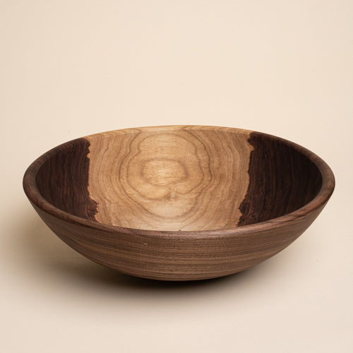 An extra large walnut wooden bowl