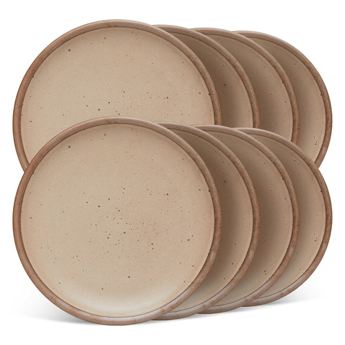 8 dinner sized ceramic plates in a warm pale brown color featuring iron speckles and an unglazed rim
