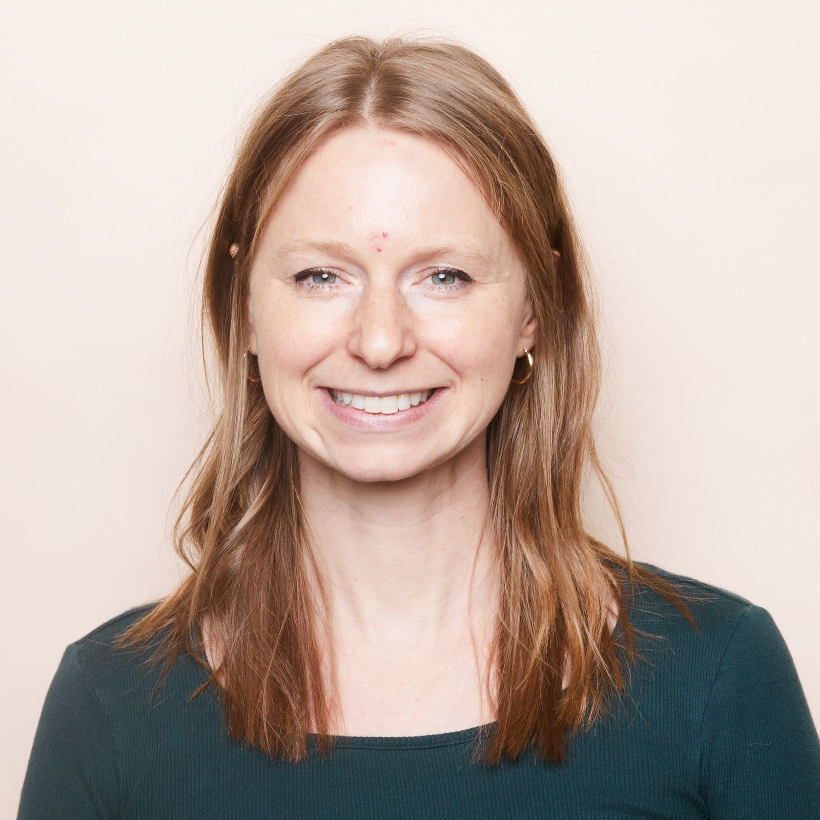 A headshot of Sarah W.