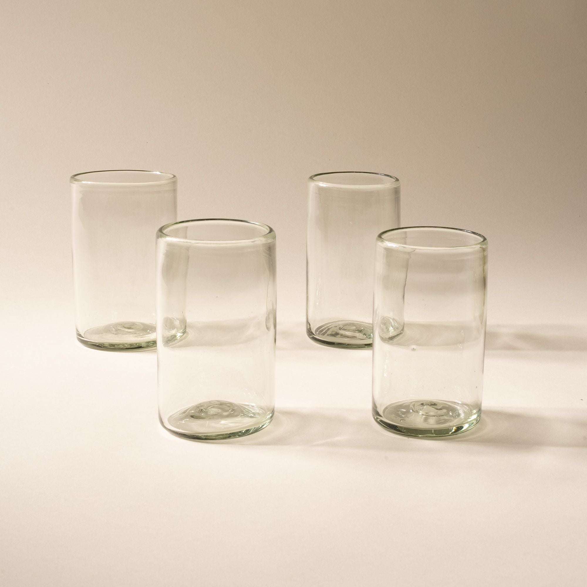 4 tall clear drinking glasses
