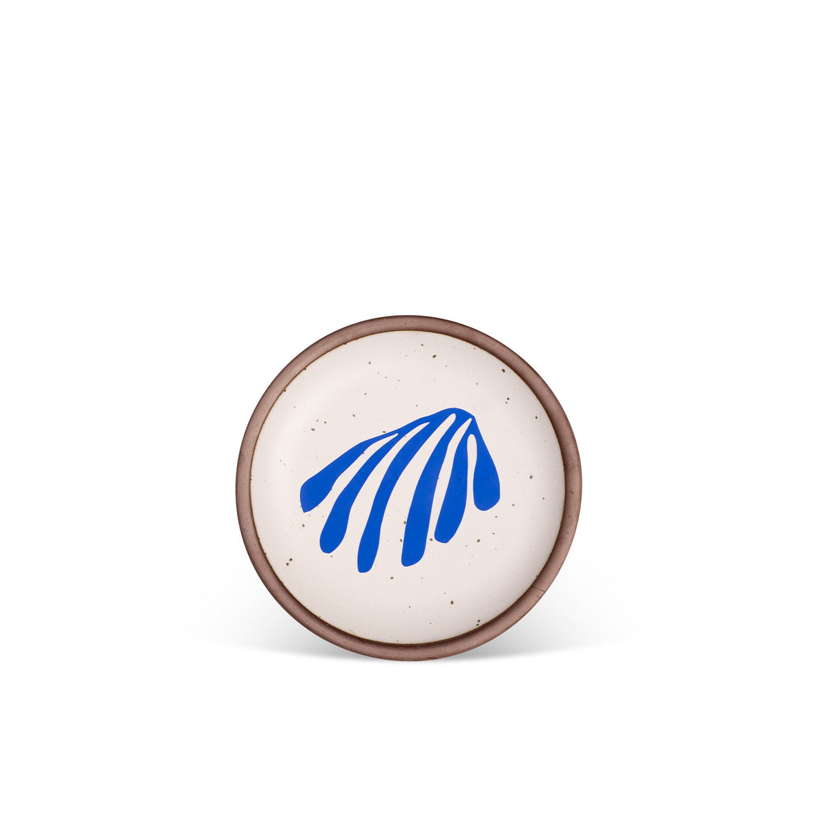 A ceramic dessert sized plates in a warm off-white color with unglazed rim, a frond-like cut-outs from Henri Matisse’s La Perruche et la sirène.