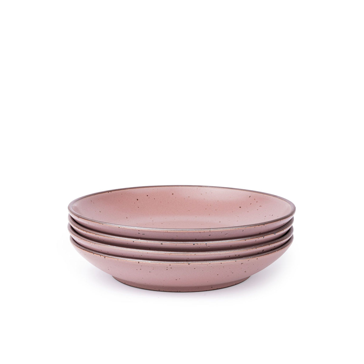A stack of 4 large ceramic plates with a curved bowl edge in a dusty mauve pink color featuring iron speckles and an unglazed rim.